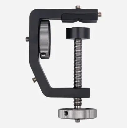 Univerzální držák pro hlavice Davros a příslušenství. Stabilní opora pro zbraň či optiku v terénu. 5 montážních bodů 1/4"-20 UNC, redukce 3/8"-16 UNC, max. rozevření 60 mm, hmotnost 270 g.